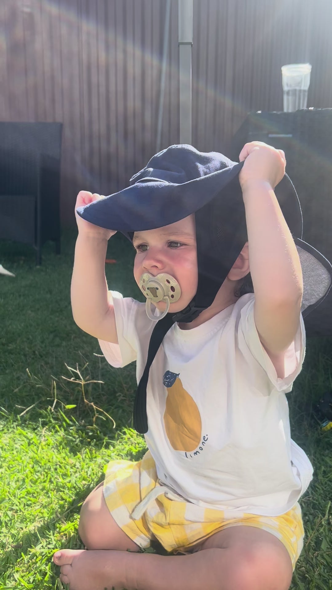 Load video: Watch as this baby plays happily outdoors in the garden under the sun, wearing a secure Luma Hat. Unlike ordinary baby sun hats that slip off easily, our unique buckle design keeps the hat safely fastened under the chin - so little hands can’t pull it off. Perfect for active toddlers and outdoor play, this UPF 50+ sun hat provides all-day protection, comfort, and peace of mind for parents.